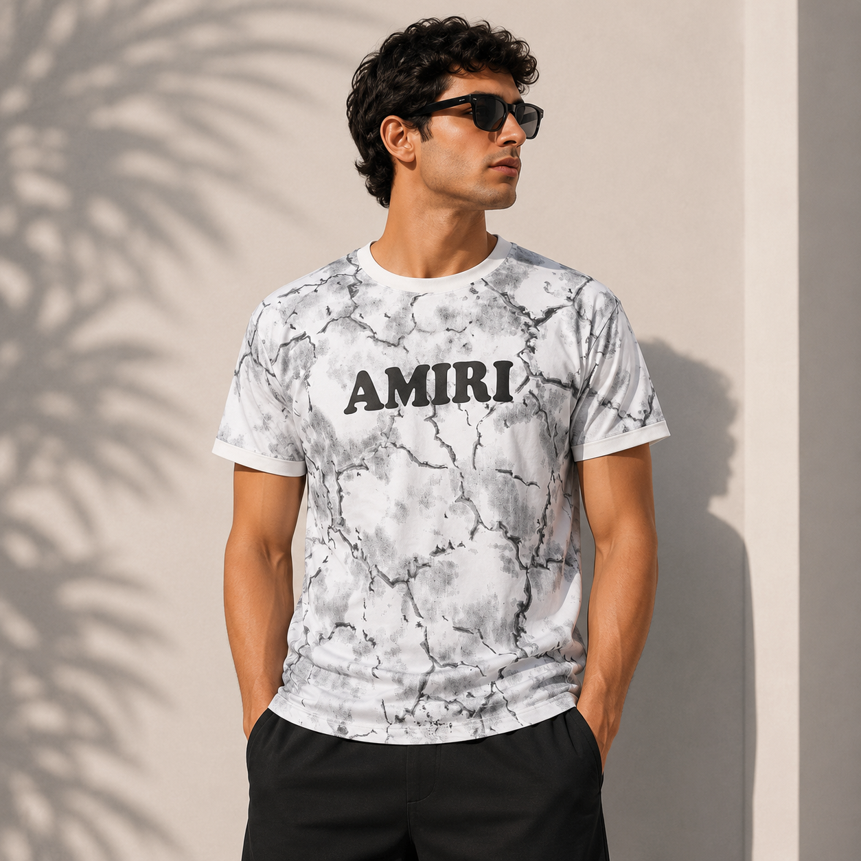 Amiri marble print T-shirt with bold logo on chest